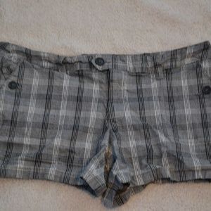 grey, black, and white checkered shorts